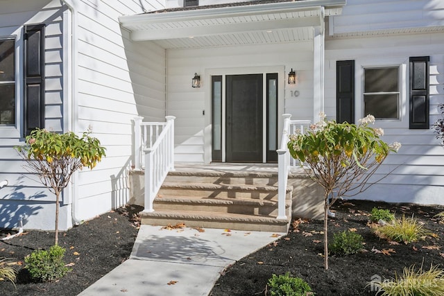 property entrance with covered porch