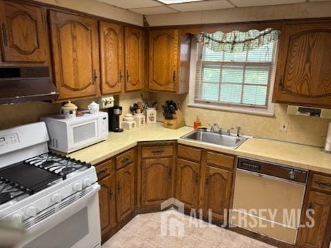 1472 Stanley Ter, Hillside, NJ 07205 - kitchen featuring white appliances, exhaust hood, brown cabinetry, light countertops, and a drop ceiling