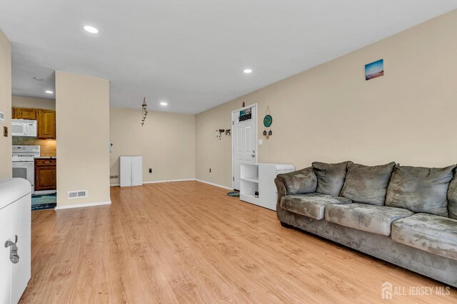 living room with light wood-type flooring