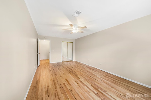 227 College Dr, Edison, NJ 08817 - spare room featuring a ceiling fan and light wood-style floors