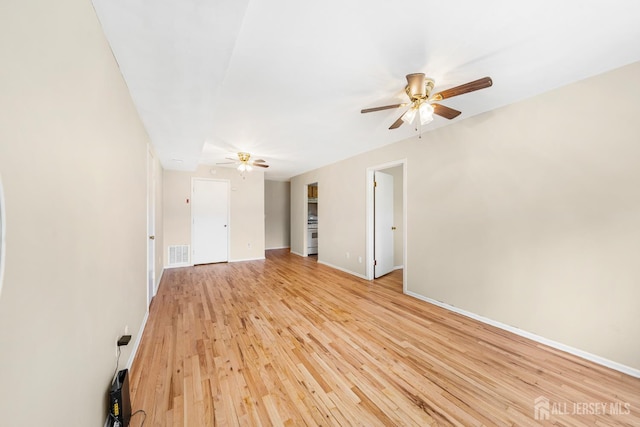 227 College Dr, Edison, NJ 08817 - spare room with ceiling fan and light wood finished floors