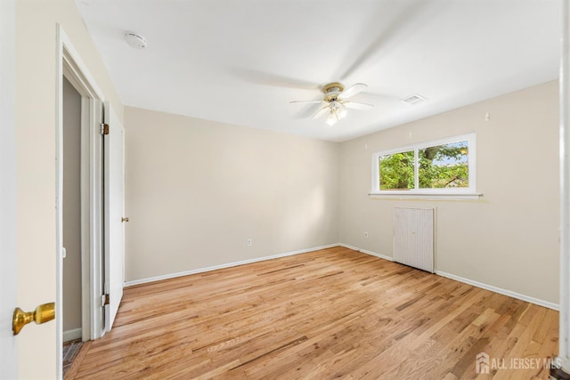 227 College Dr, Edison, NJ 08817 - unfurnished bedroom with light wood finished floors and a ceiling fan