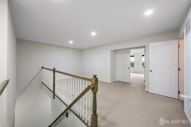 30 Clover Ln, Monroe, NJ 08831 - corridor featuring an upstairs landing, light colored carpet, and recessed lighting