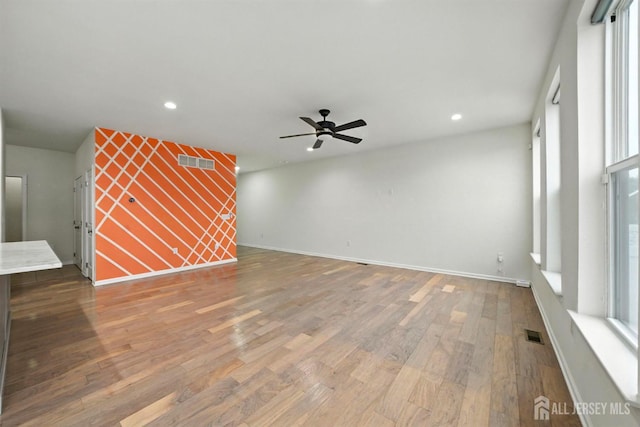 30 Clover Ln, Monroe, NJ 08831 - unfurnished living room with wood finished floors, a ceiling fan, and recessed lighting