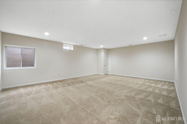 30 Clover Ln, Monroe, NJ 08831 - empty room with light carpet and recessed lighting