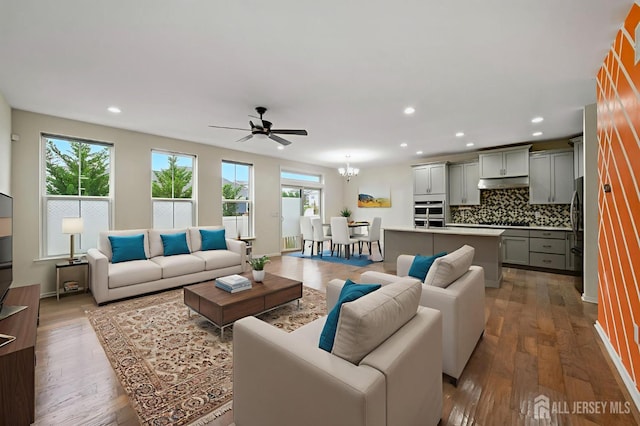 30 Clover Ln, Monroe, NJ 08831 - living area featuring a ceiling fan, wood-type flooring, recessed lighting, and a chandelier