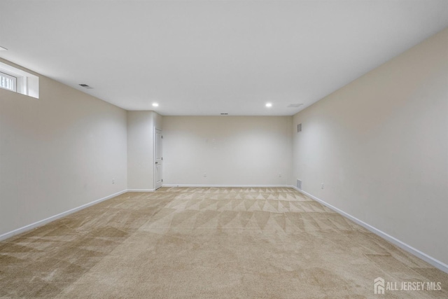 30 Clover Ln, Monroe, NJ 08831 - empty room with light colored carpet and recessed lighting
