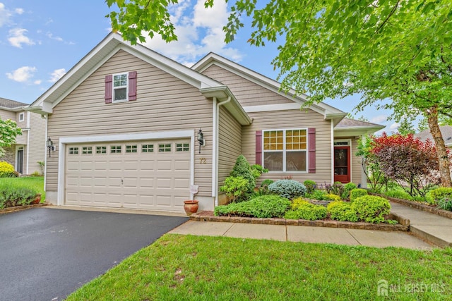 72 Wintergreen Dr, Manalapan, NJ 07726 - view of front of home featuring driveway