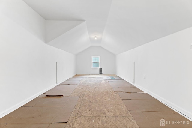 72 Wintergreen Dr, Manalapan, NJ 07726 - additional living space with vaulted ceiling and baseboards
