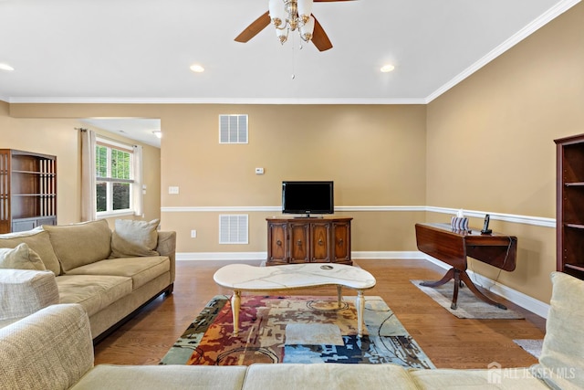 72 Wintergreen Dr, Manalapan, NJ 07726 - living area with a ceiling fan, wood finished floors, baseboards, ornamental molding, and recessed lighting