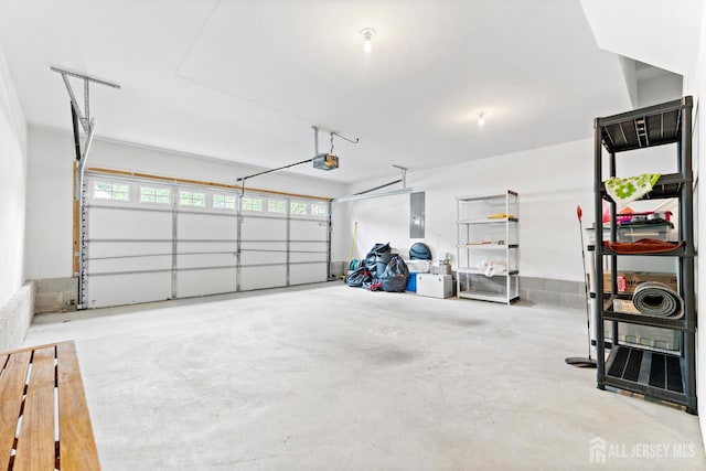 72 Wintergreen Dr, Manalapan, NJ 07726 - garage featuring electric panel and a garage door opener