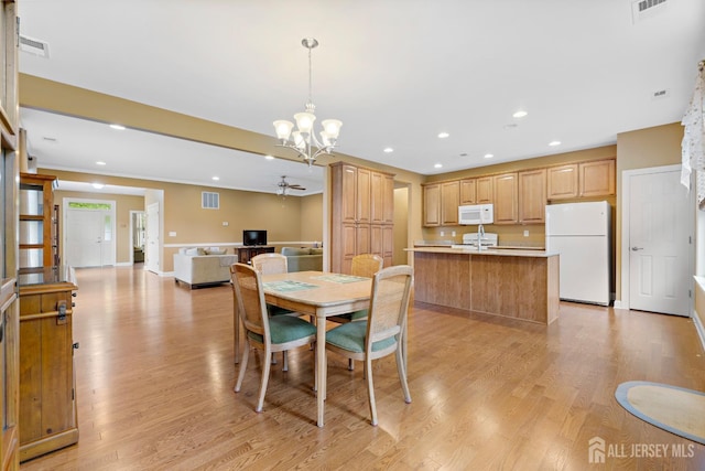 72 Wintergreen Dr, Manalapan, NJ 07726 - dining space featuring recessed lighting, light wood-type flooring, a chandelier, baseboards, and a ceiling fan