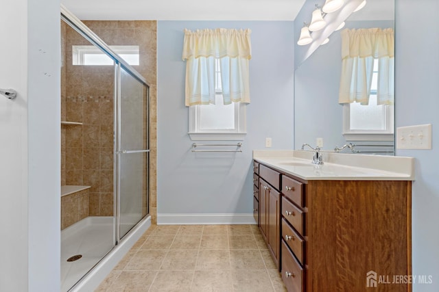 72 Wintergreen Dr, Manalapan, NJ 07726 - bathroom featuring vanity, a stall shower, and baseboards