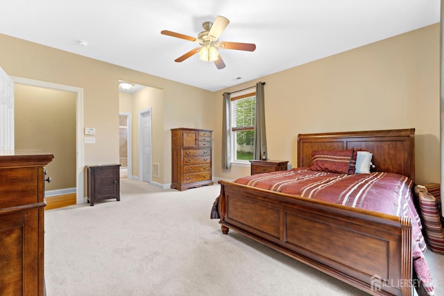 72 Wintergreen Dr, Manalapan, NJ 07726 - bedroom with light colored carpet, a ceiling fan, and baseboards