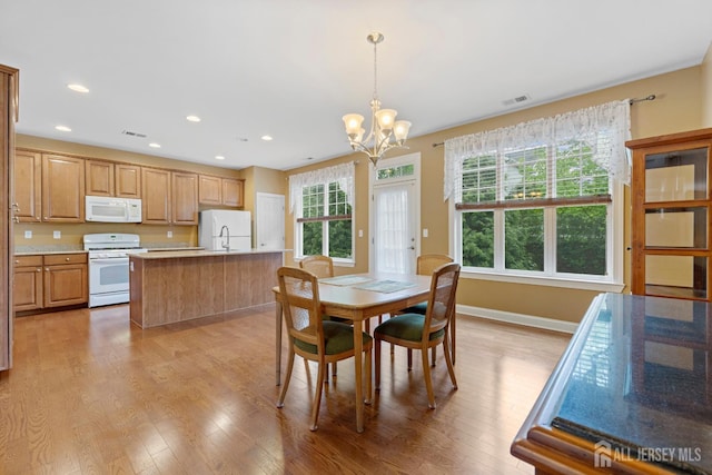 72 Wintergreen Dr, Manalapan, NJ 07726 - dining space with a chandelier, light wood-type flooring, recessed lighting, and baseboards