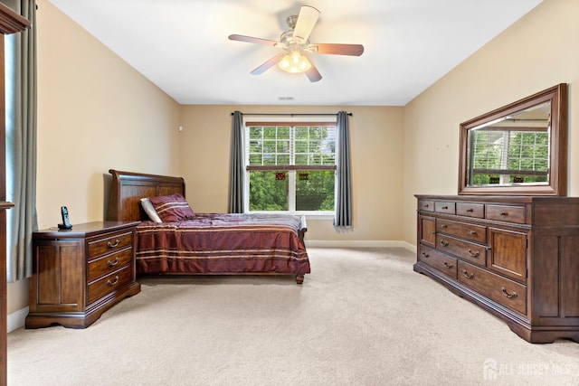 72 Wintergreen Dr, Manalapan, NJ 07726 - bedroom featuring light carpet, baseboards, and a ceiling fan