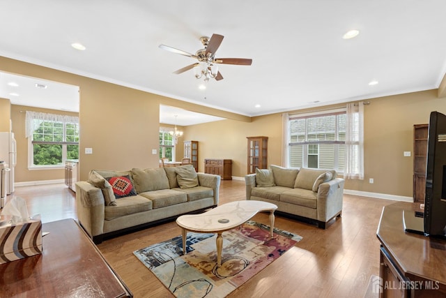 72 Wintergreen Dr, Manalapan, NJ 07726 - living area with a ceiling fan, recessed lighting, a chandelier, light wood finished floors, and baseboards