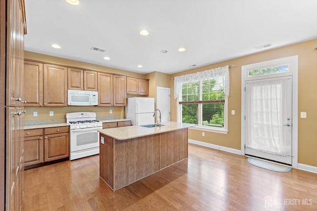 72 Wintergreen Dr, Manalapan, NJ 07726 - kitchen with white appliances, a sink, light wood-type flooring, baseboards, and recessed lighting