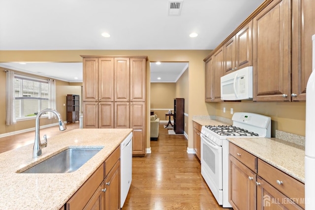 72 Wintergreen Dr, Manalapan, NJ 07726 - kitchen with white appliances, a sink, light wood finished floors, light stone counters, and recessed lighting