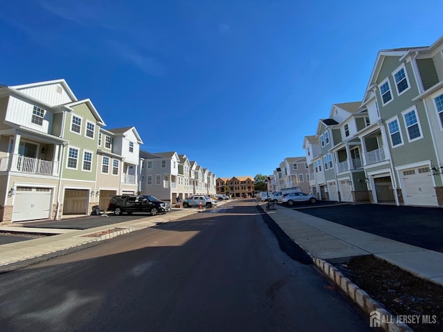 view of street featuring sidewalks and a residential view