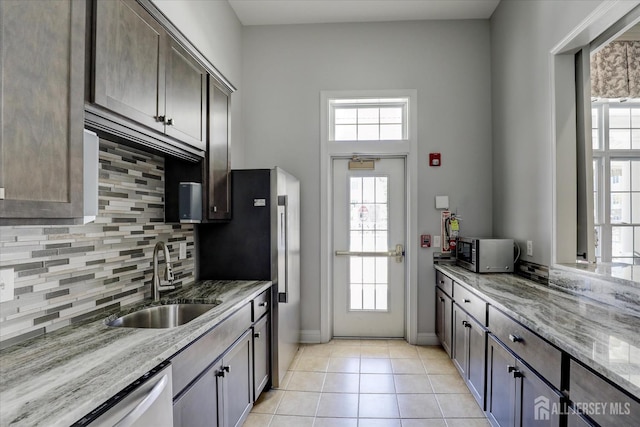 4215 Falston Cir Unit 15, Old Bridge, NJ 08857 - kitchen featuring healthy amount of natural light, stainless steel microwave, dishwasher, and tasteful backsplash