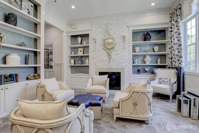 4215 Falston Cir Unit 15, Old Bridge, NJ 08857 - sitting room with built in shelves, ornamental molding, recessed lighting, and a fireplace