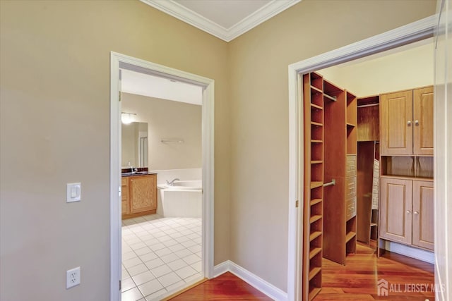 4215 Falston Cir Unit 15, Old Bridge, NJ 08857 - hallway with ornamental molding and wood finished floors