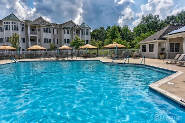 4215 Falston Cir Unit 15, Old Bridge, NJ 08857 - community pool featuring a patio