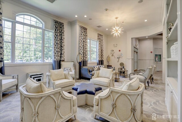 4215 Falston Cir Unit 15, Old Bridge, NJ 08857 - living room featuring a chandelier, light colored carpet, ornamental molding, and recessed lighting