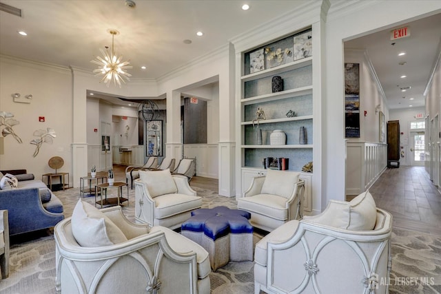 4215 Falston Cir Unit 15, Old Bridge, NJ 08857 - living room with built in features, a decorative wall, a chandelier, recessed lighting, and crown molding