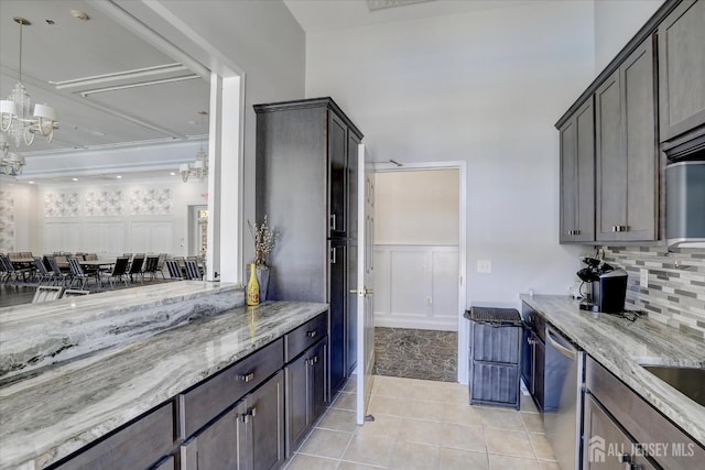 4215 Falston Cir Unit 15, Old Bridge, NJ 08857 - kitchen featuring dishwasher, backsplash, light stone countertops, a chandelier, and light tile patterned floors