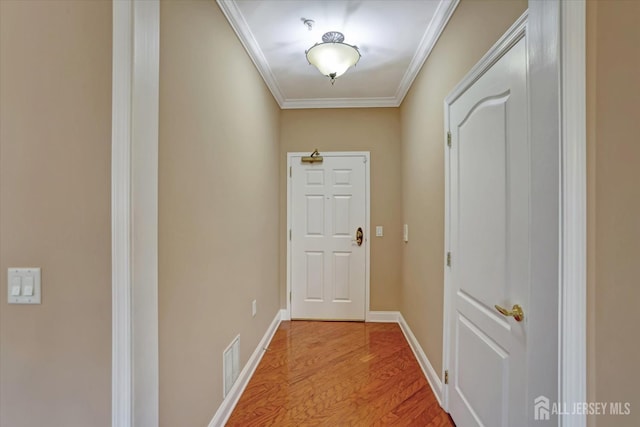 4215 Falston Cir Unit 15, Old Bridge, NJ 08857 - doorway featuring crown molding and light wood finished floors
