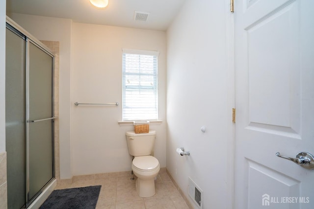 460 Morning Glory Dr, Monroe, NJ 08831 - bathroom with a shower with shower door, toilet, and tile patterned floors