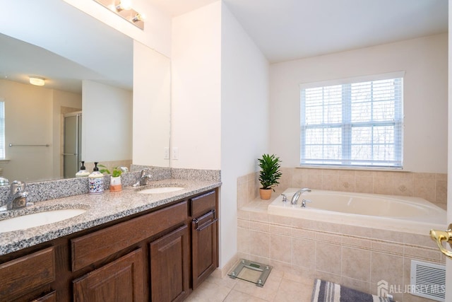 460 Morning Glory Dr, Monroe, NJ 08831 - full bathroom featuring a garden tub, tile patterned floors, a stall shower, and double vanity