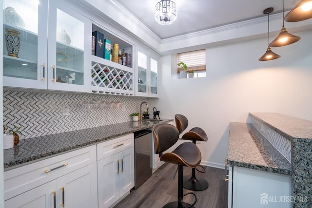 460 Morning Glory Dr, Monroe, NJ 08831 - indoor wet bar featuring stainless steel dishwasher, crown molding, decorative backsplash, dark wood-style floors, and pendant lighting