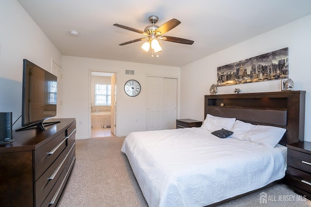 460 Morning Glory Dr, Monroe, NJ 08831 - bedroom featuring light carpet, baseboards, connected bathroom, a closet, and a ceiling fan