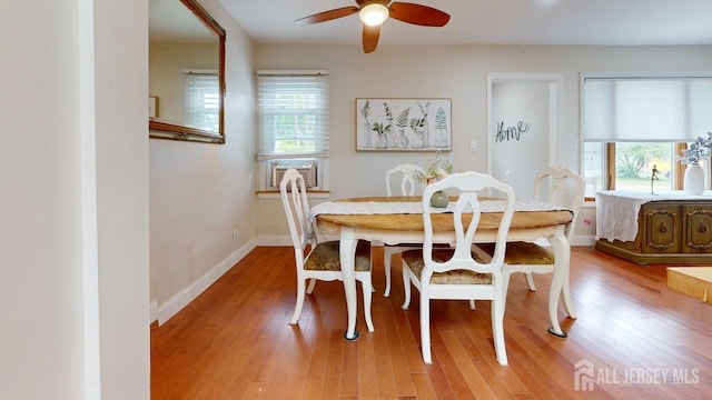 496 Calvert Rd, North Brunswick, NJ 08902 - dining space with ceiling fan, light wood-type flooring, baseboards, and cooling unit