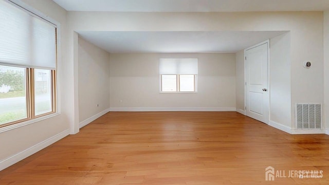 496 Calvert Rd, North Brunswick, NJ 08902 - unfurnished room with light wood finished floors and baseboards