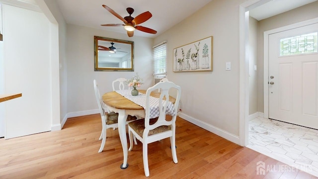 496 Calvert Rd, North Brunswick, NJ 08902 - dining area featuring plenty of natural light, ceiling fan, baseboards, and light wood-type flooring