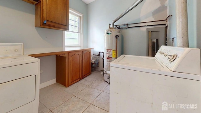 496 Calvert Rd, North Brunswick, NJ 08902 - washroom with washer and dryer, cabinet space, water heater, and light tile patterned floors