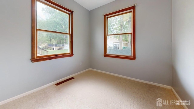 496 Calvert Rd, North Brunswick, NJ 08902 - unfurnished room featuring baseboards and carpet flooring