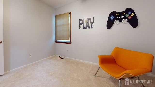 496 Calvert Rd, North Brunswick, NJ 08902 - living area featuring carpet floors and baseboards