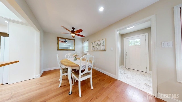 496 Calvert Rd, North Brunswick, NJ 08902 - dining space with light wood-type flooring, ceiling fan, baseboards, and recessed lighting