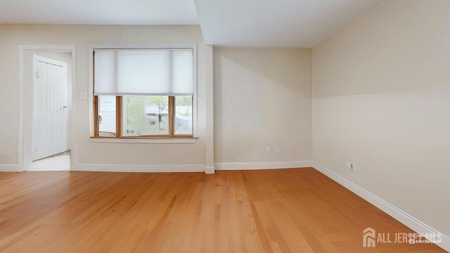 496 Calvert Rd, North Brunswick, NJ 08902 - spare room with baseboards and light wood-style floors