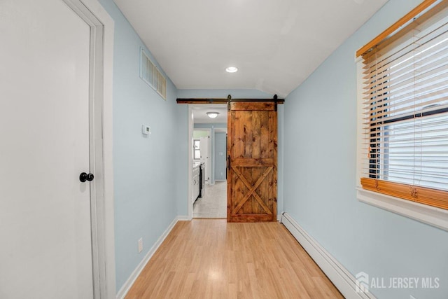 117 Burlington Ave, Leonardo, NJ 07737 - hall featuring light wood-style floors, a barn door, baseboards, a baseboard radiator, and lofted ceiling