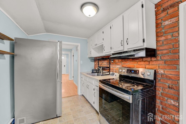117 Burlington Ave, Leonardo, NJ 07737 - kitchen featuring stainless steel appliances, under cabinet range hood, white cabinetry, vaulted ceiling, and a sink