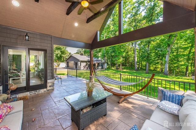 view of patio with ceiling fan and an outdoor hangout area