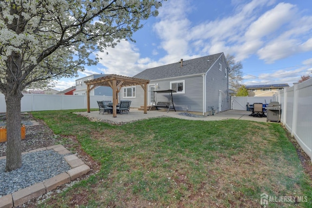 117 Whitman St, Carteret, NJ 07008 - rear view of house with a pergola, a yard, a fenced backyard, and a patio area