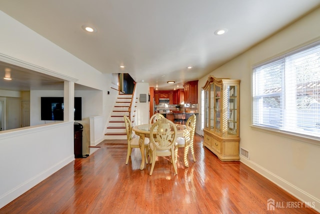 117 Whitman St, Carteret, NJ 07008 - dining area with recessed lighting, baseboards, and light wood-style floors