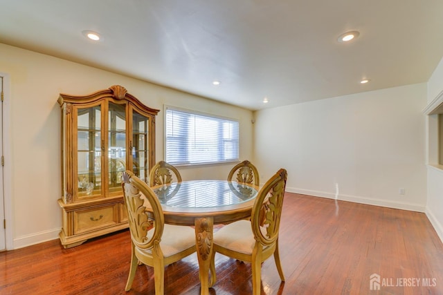 117 Whitman St, Carteret, NJ 07008 - dining area with dark wood-style floors, recessed lighting, and baseboards